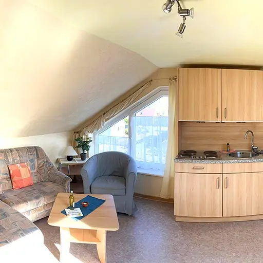 Wohnzimmer mit Küche